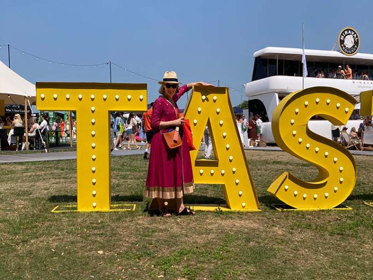 caroline at taste of london signage in june 2025 heatwave