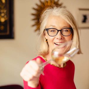wine expert caroline sharley checking the colour of the wine
