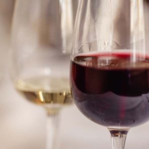 two glasses of wine one white one red